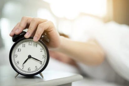 A hand holding a clock
Description automatically generated A hand holding a clock
Description automatically generated