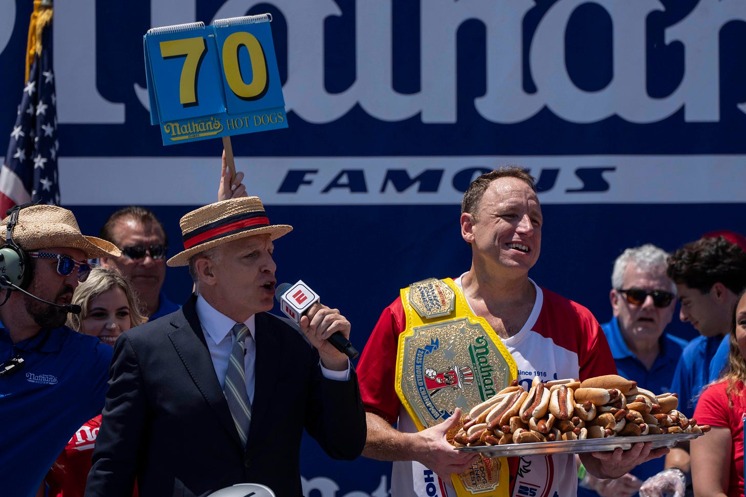 Joey Chestnut reclaims title in Nathan's Famous hot dog eating contest,  wins 17th Mustard Belt