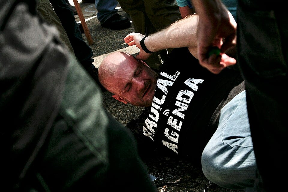 File:Christopher Cantwell at Unite the RIght pepper-sprayed.jpg
