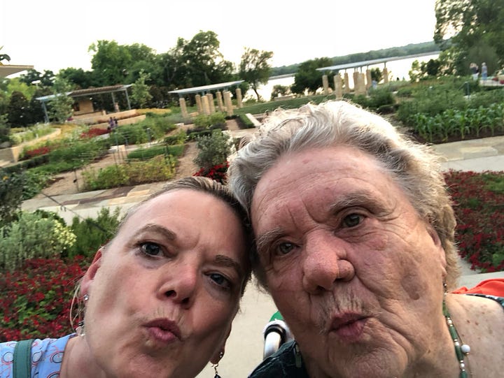 3 Pictures of Melora Fern and her mom - "Tutu" taking selfies, one picture of Melora Ferns parents in silhouette, kissing in front of a sunset