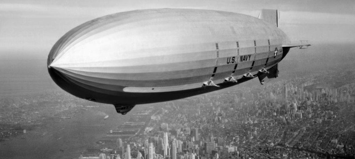 The USS Macon, an American airship, floating over the city of New York in 1933 The USS Macon, an American airship, floating over the city of New York in 1933