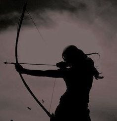 This may contain: the silhouette of a woman holding a bow and arrow in front of a cloudy sky
