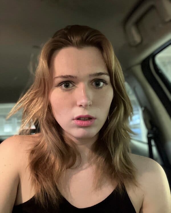 Marcy Rheintgen looking into the camera and wearing a black sleeveless top.