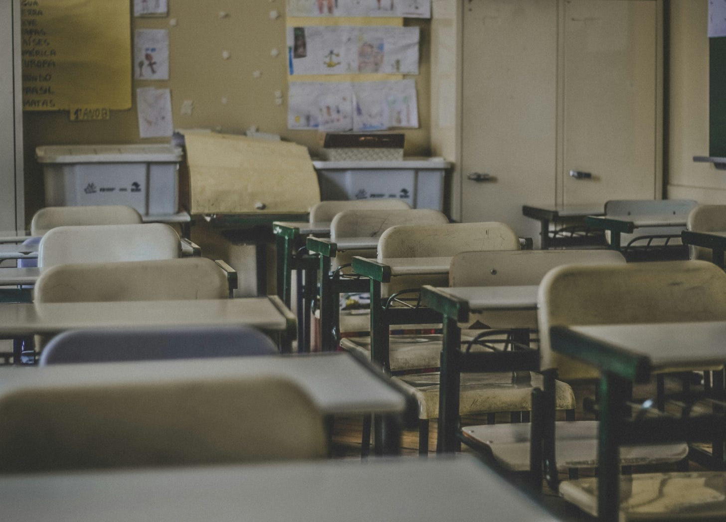 Visual representation of the challenges in K-12 education, focusing on the struggle to balance academic priorities with gender identity discussions in a failing system