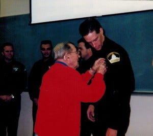 My 96 year old grandfather pinning my badge on me when I got sworn is an an-call deputy