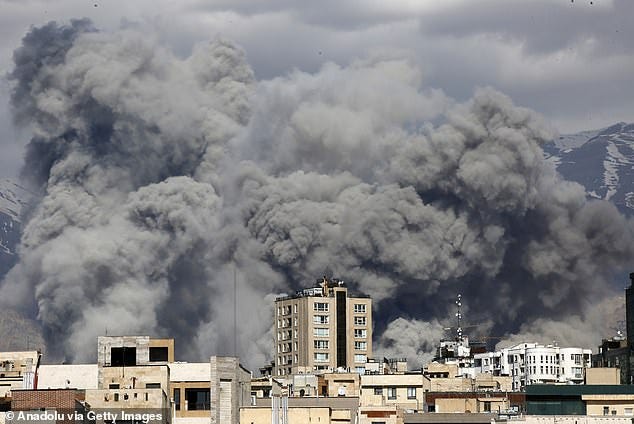 Smoke rises from an area of Tehran after it was targeted in attacks as a series of explosions were heard in the Iranian capital