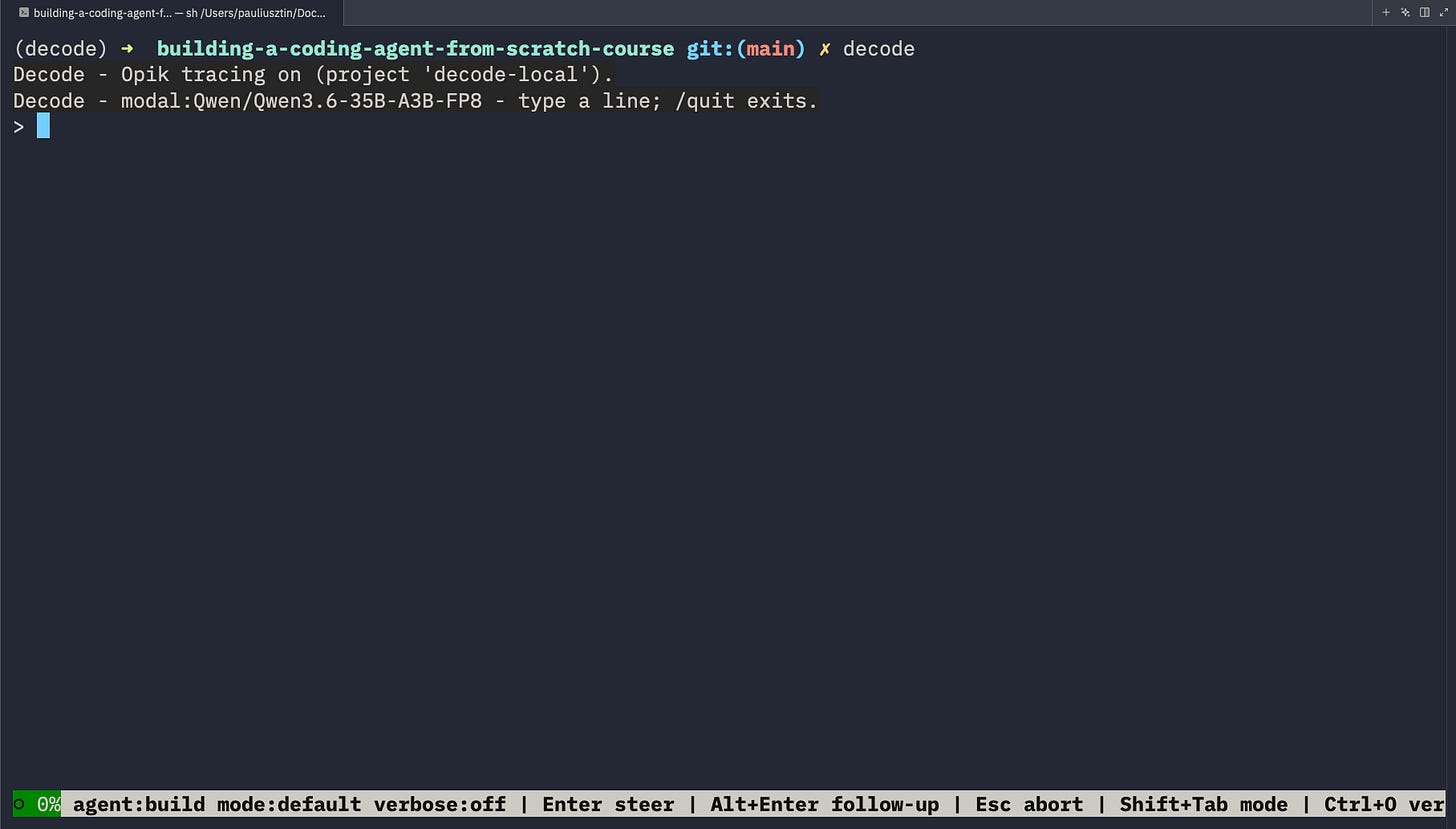 The Decode TUI on startup — the Modal-served model in the banner, Opik tracing on, and the footer naming all three input modes.
