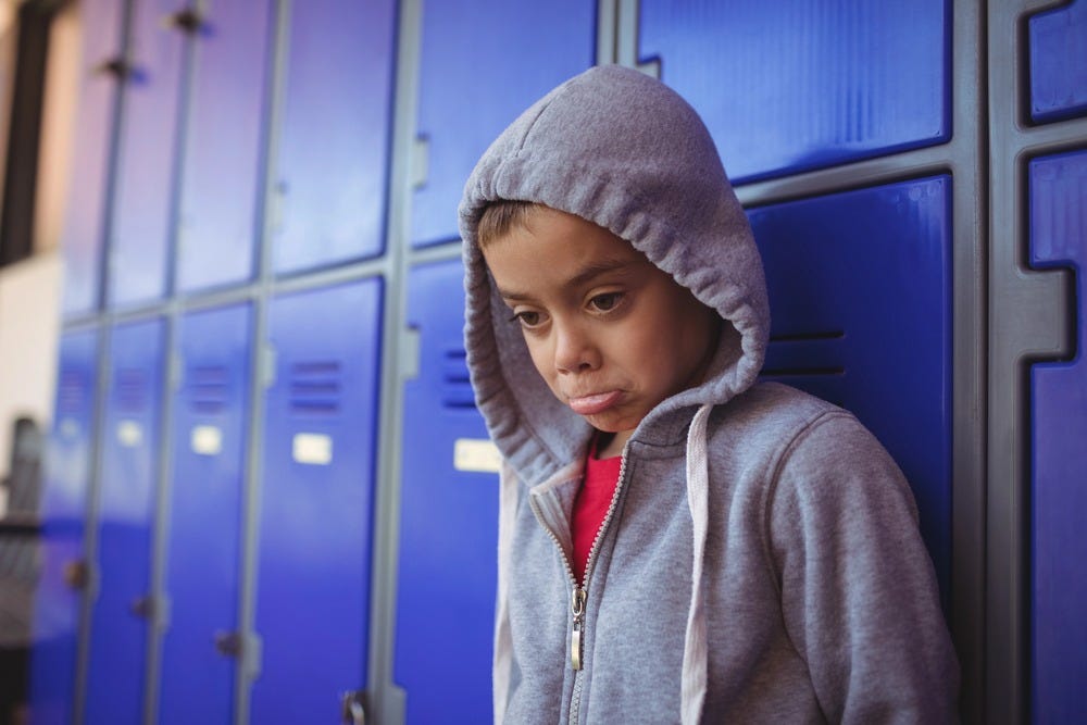 sad child at school drop off