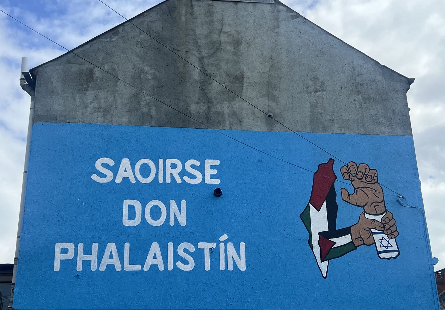 WATCH: Kneecap mural gives voice to Palestinian suffering