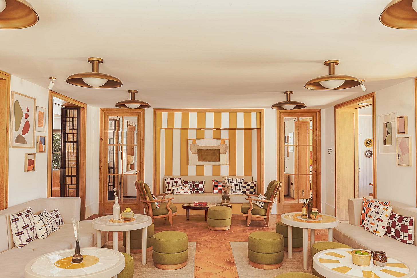 Wicker, terracotta, and olive tones at Hotel Lou Pinet, Saint-Tropez