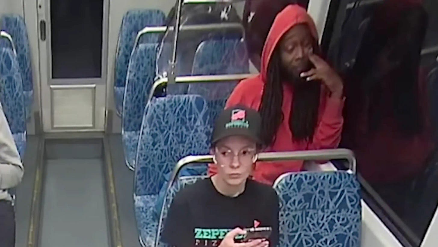 Surveillance footage shows the suspect sitting behind Iryna Zarutska on a Charlotte light rail train