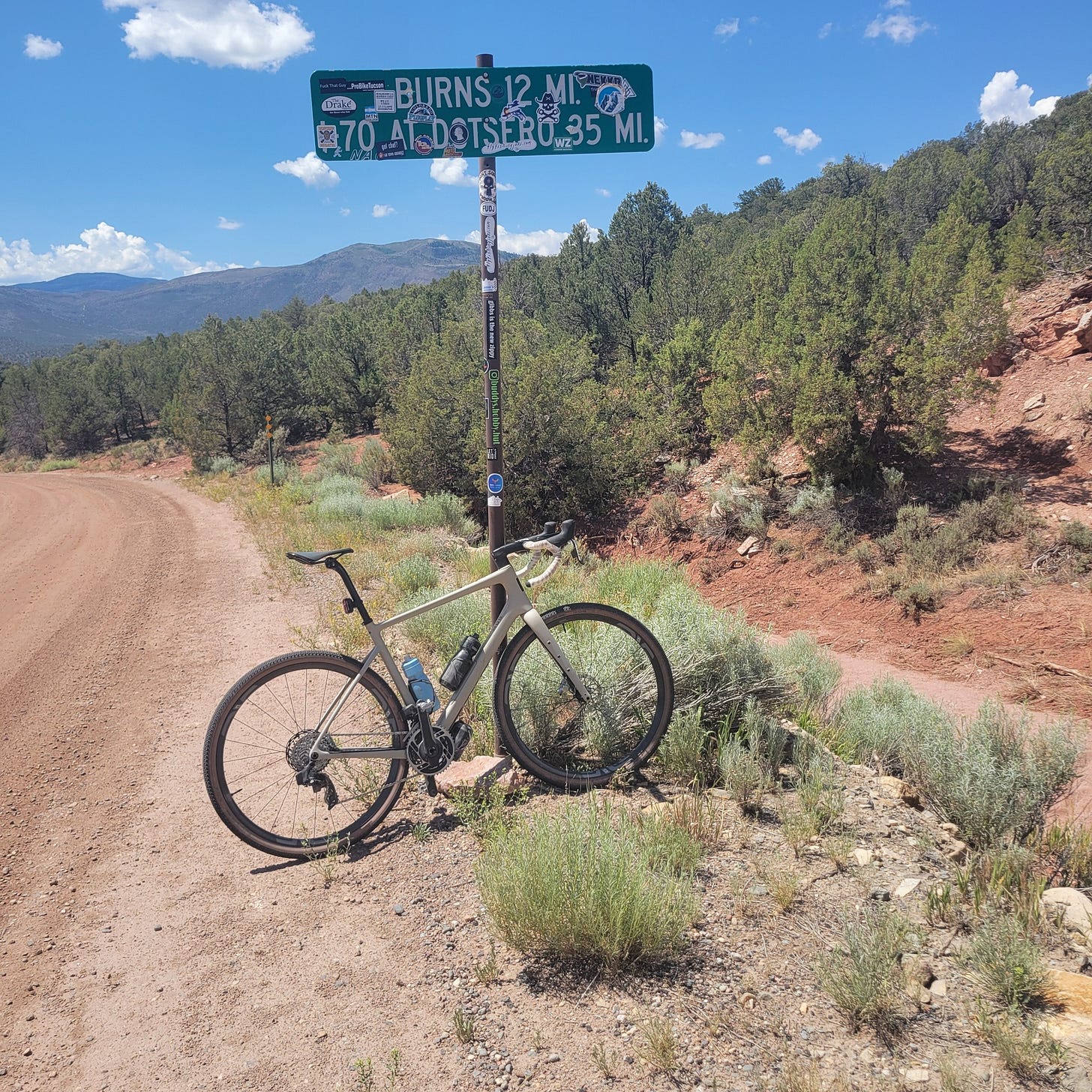 May be an image of bicycle and text