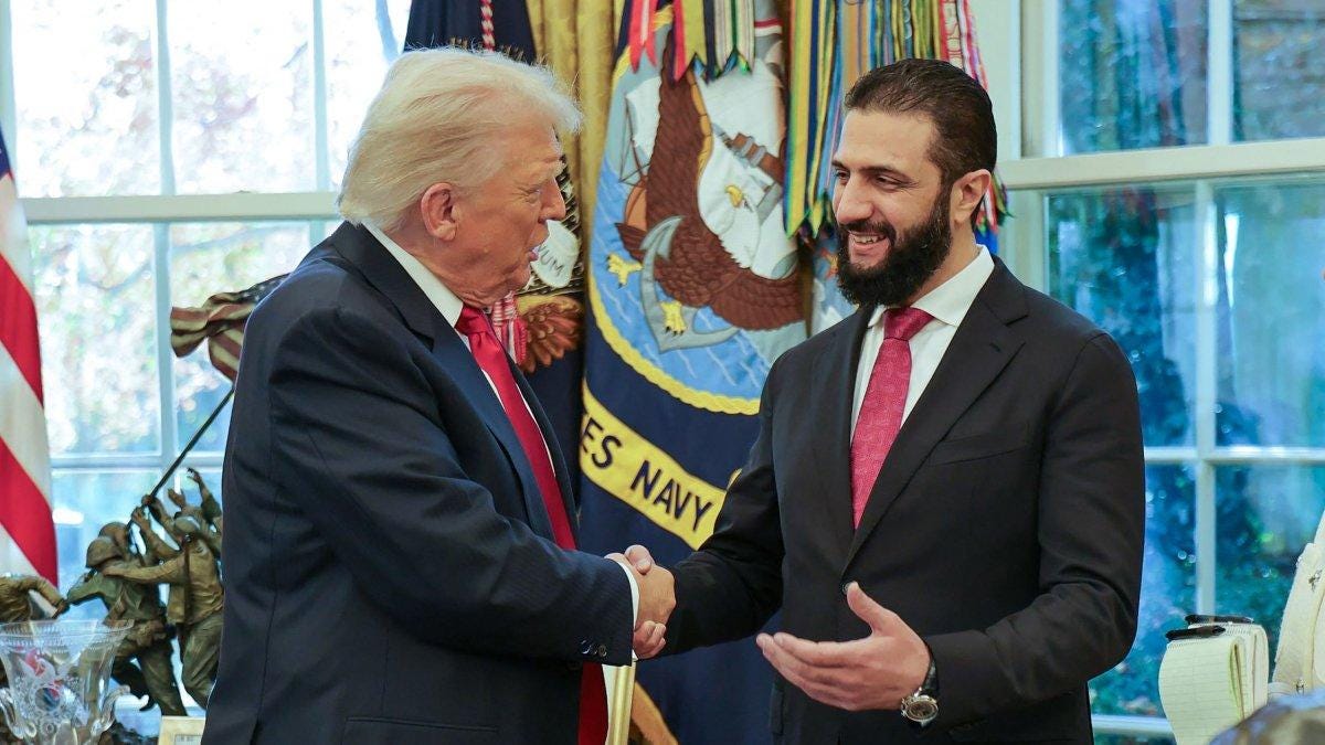 U.S. President Donald Trump (L) shakes hands with Syrian President Ahmed al-Sharaa at the White House, Washington, U.S., Nov. 10, 2025. (AFP Photo)