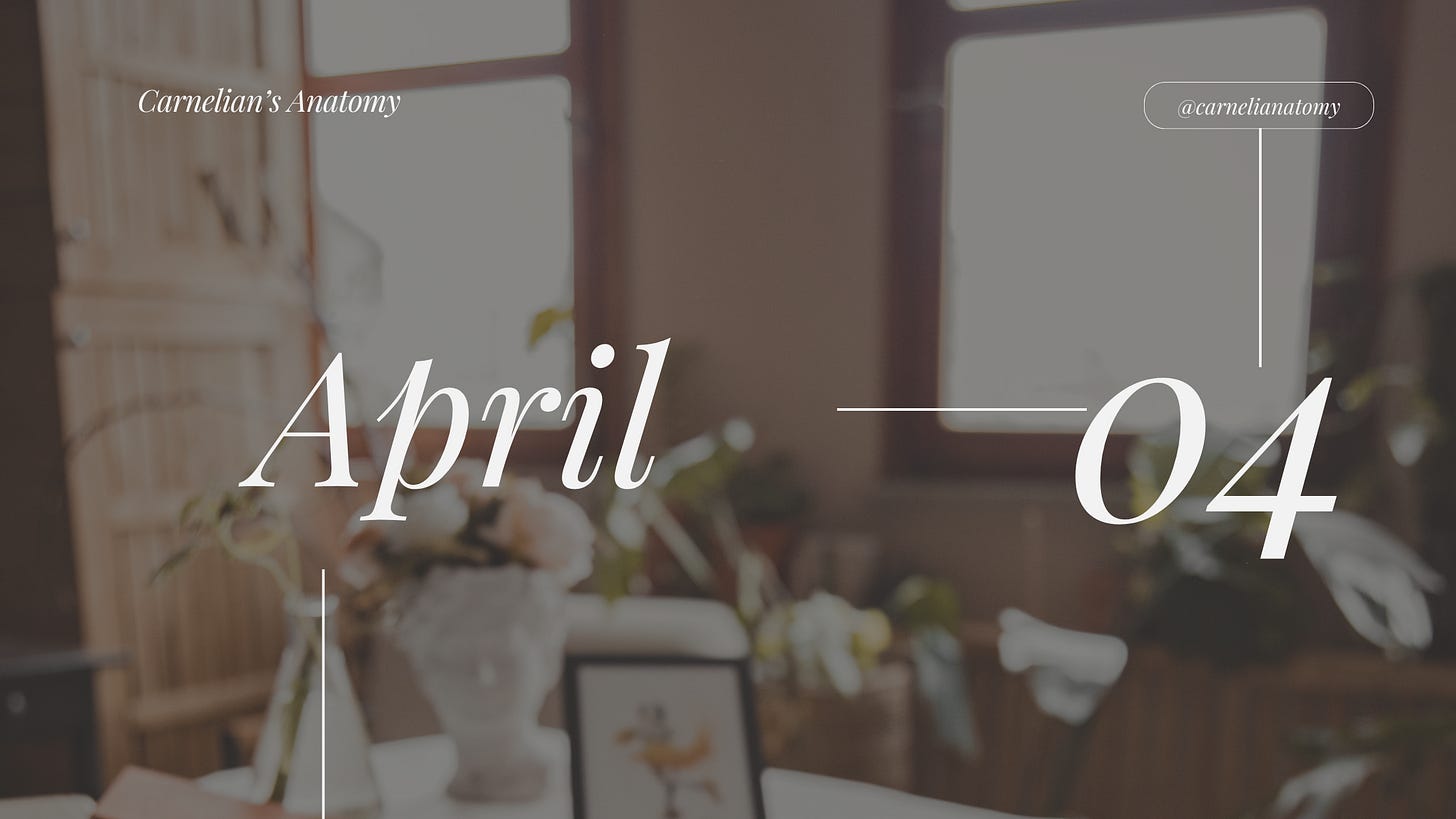 Pictured is a banner for the month of April. The top layer is the numerical month and our publication user name. The background is a blurry image of a bedroom with house plants and standalone dresser in the back.