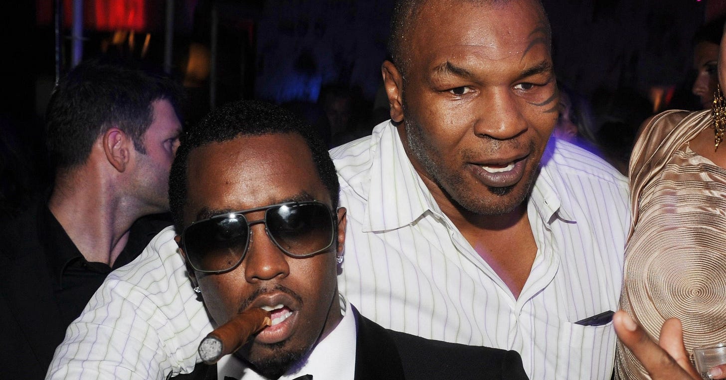 Mike Tyson Moves Diddy's Hand Away From His Butt In Resurfaced Clip, 50  Cent Jokes