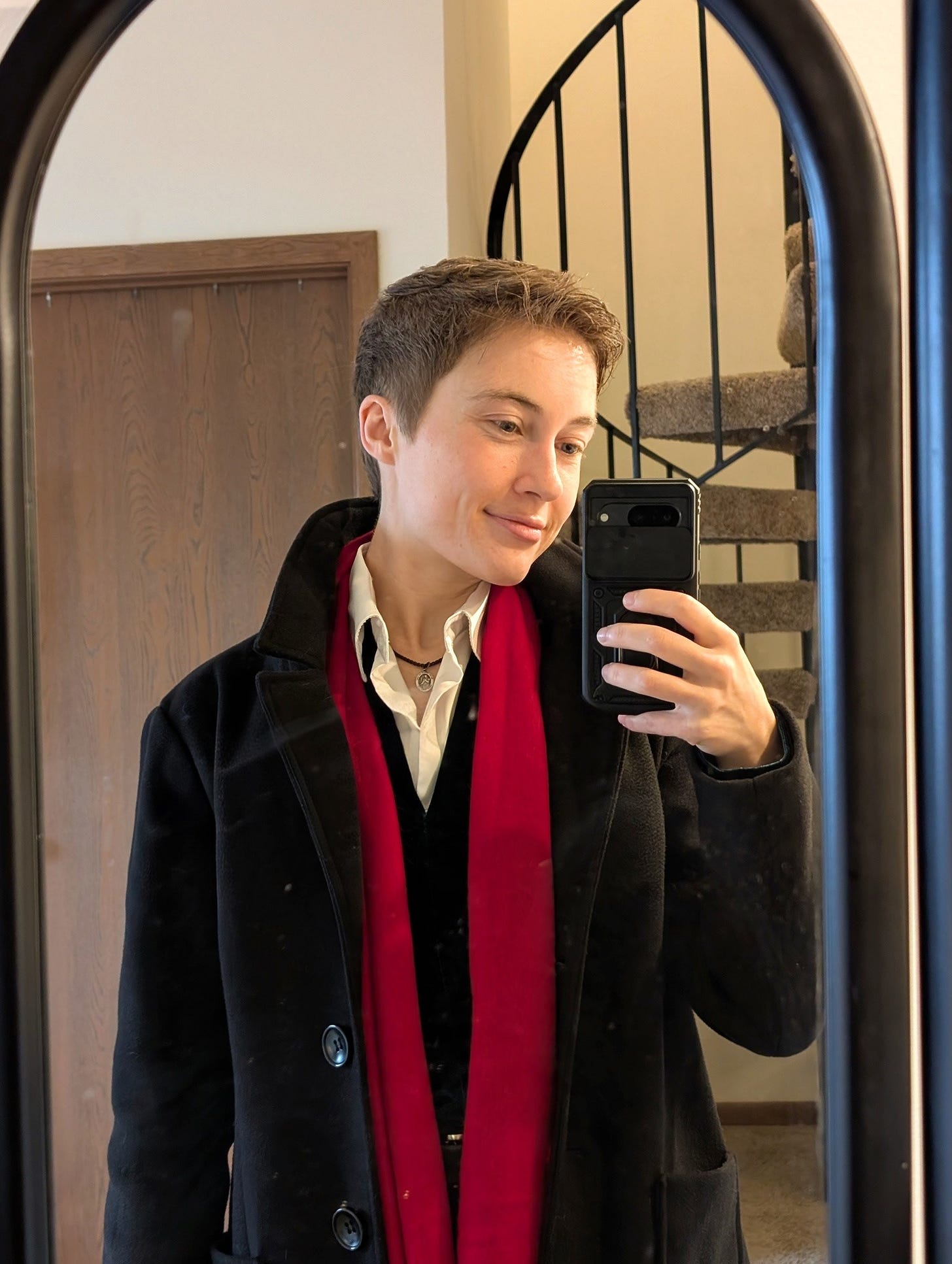 May be an image of scarf, overcoat and duffle coat