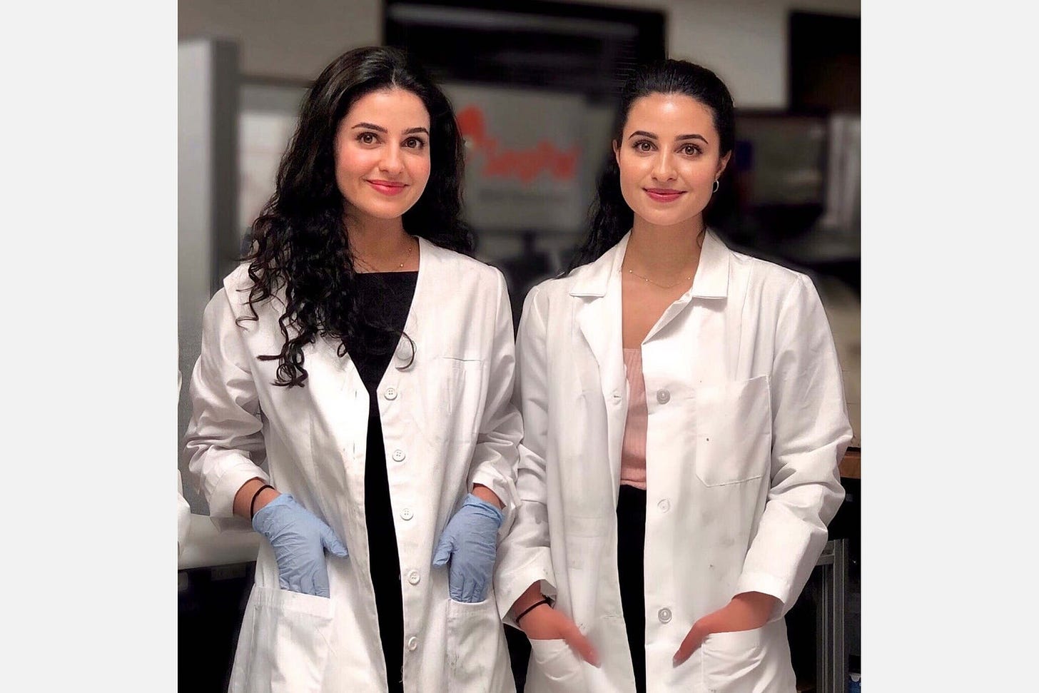Image may contain Clothing Apparel Coat Lab Coat Human and Person Image may contain Clothing Apparel Coat Lab Coat Human and Person