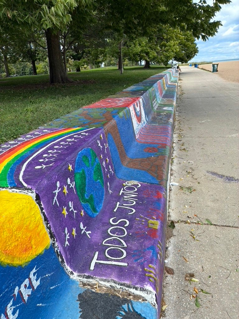 A painted bench along a sidewalk

AI-generated content may be incorrect.
