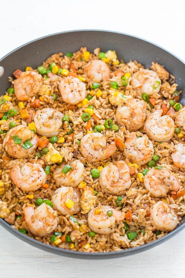 Easy Better-Than-Takeout Shrimp Fried Rice - One-skillet, ready in 20 minutes, and you'll never takeout again!! Homemade tastes WAY BETTER!! Tons more flavor, not greasy, and loaded with tender shrimp!! Easy Better-Than-Takeout Shrimp Fried Rice - One-skillet, ready in 20 minutes, and you'll never takeout again!! Homemade tastes WAY BETTER!! Tons more flavor, not greasy, and loaded with tender shrimp!!