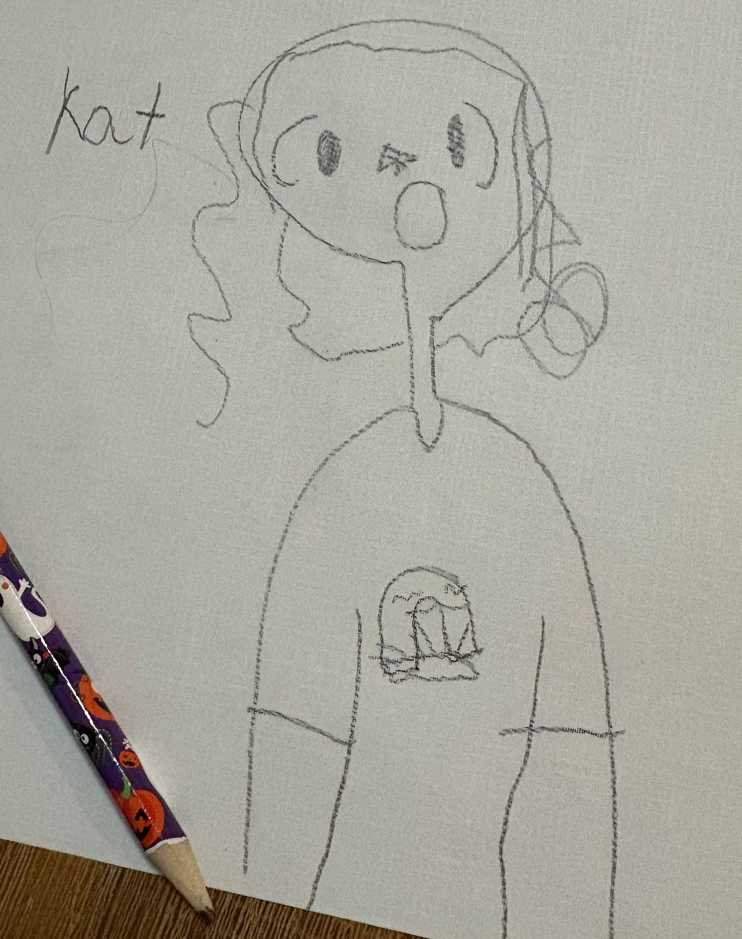 A pencil sketch on white paper of Kathryn with a surprised expression on her face, and the word "Kat" identifying the character.