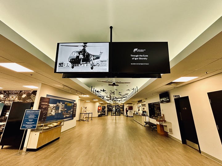 snow, trees, parking lot, cars, signs