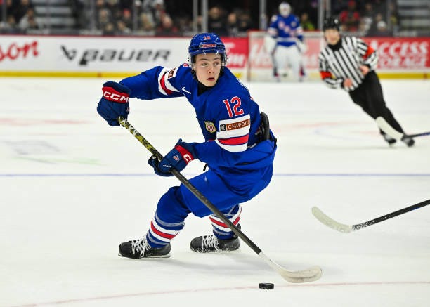 James Hagens of Team USA skates the puck in the first period against Team Finland of the Group A match during the 2025 IIHF World Junior Championship...