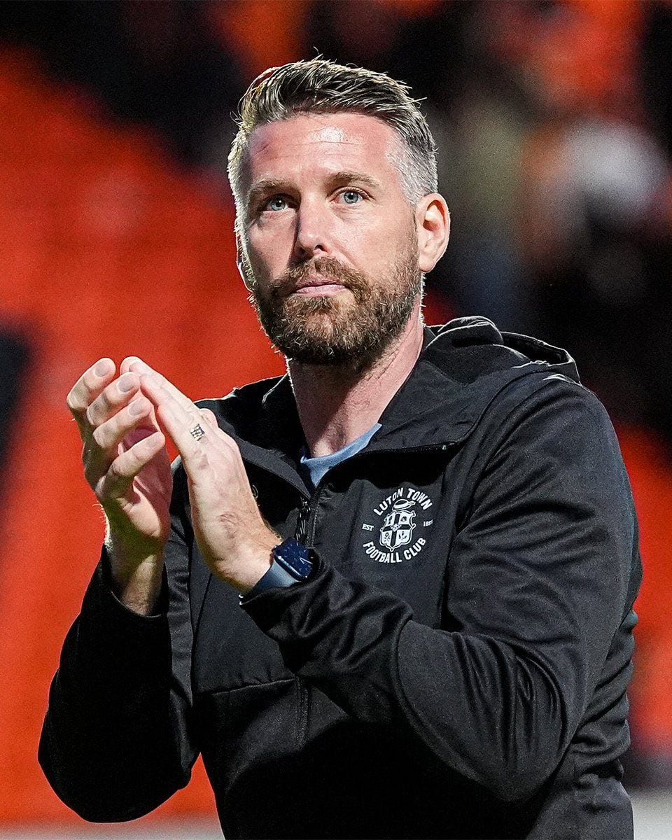 Rob Edwards clapping the Luton fans at Tannadice Park.