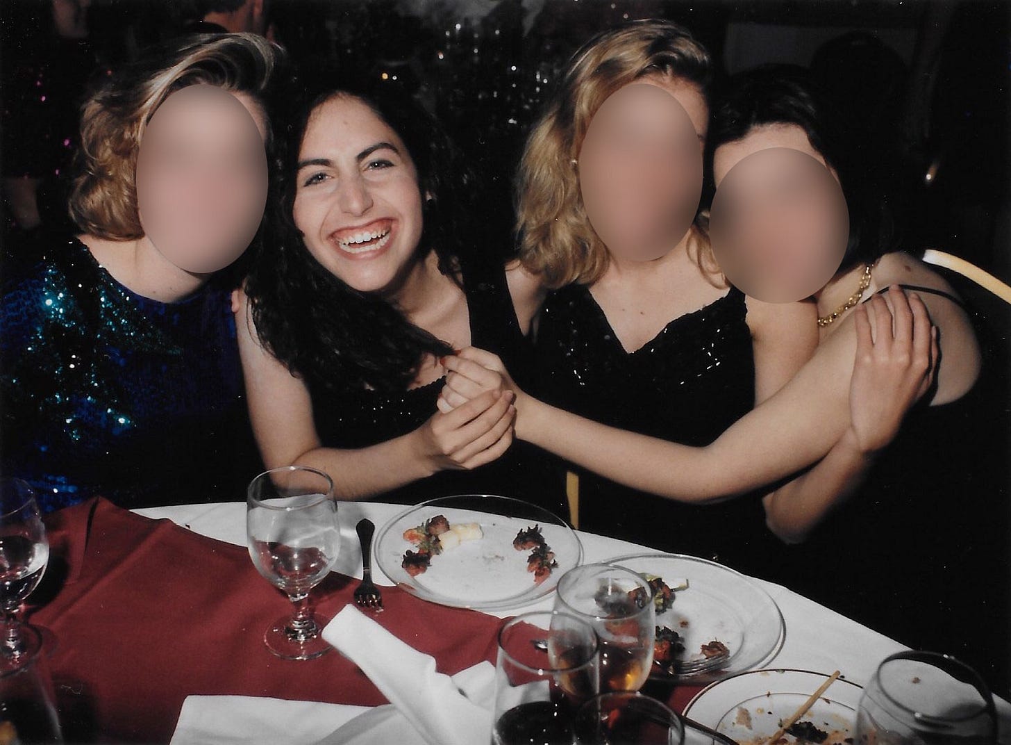 Me freshman year of college at a sorority formal, sitting at a table laughing with three of my friends Me freshman year of college at a sorority formal, sitting at a table laughing with three of my friends