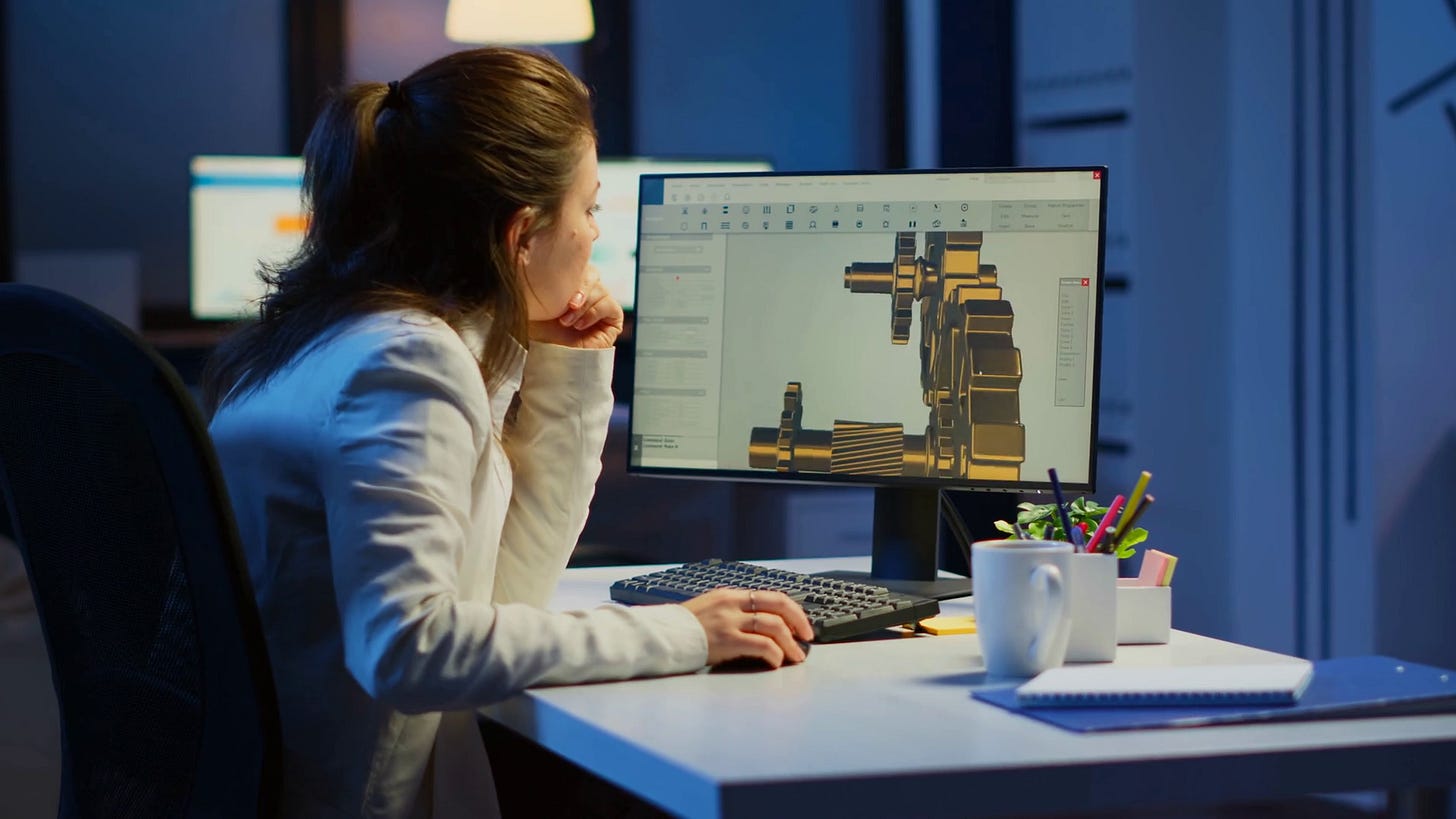Tired woman architect working on modern cad program overtime sitting at ...