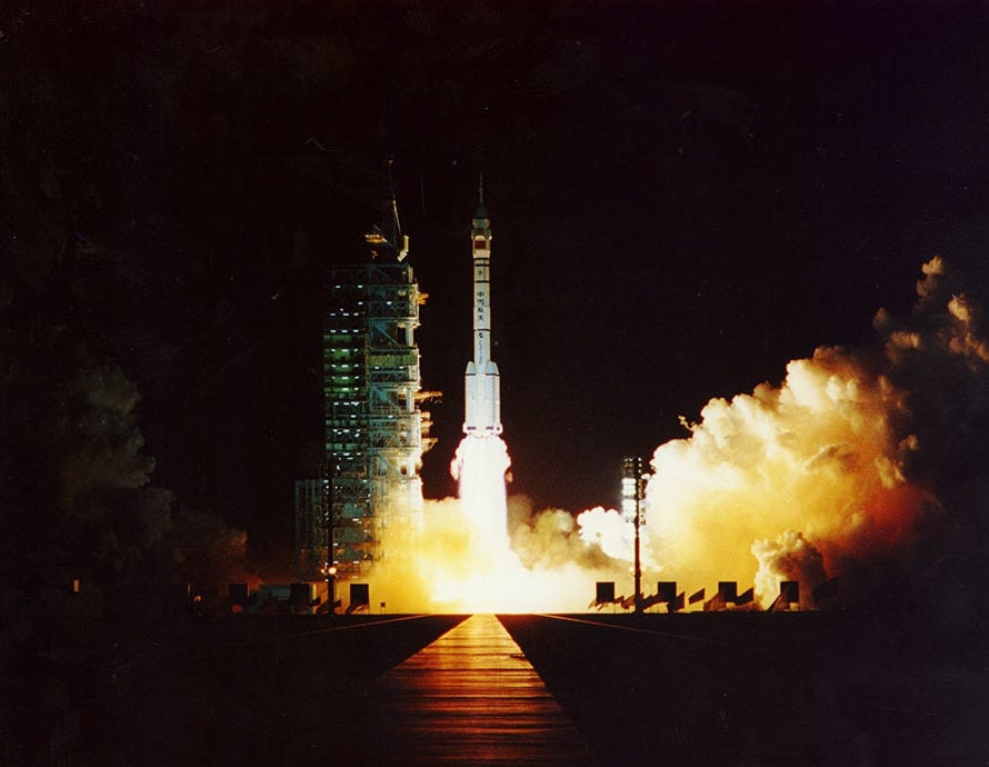 A Long March 2F lifting off for the Shenzhou-1 mission on November 20th 1999, via Global Times. A Long March 2F lifting off for the Shenzhou-1 mission on November 20th 1999, via Global Times.