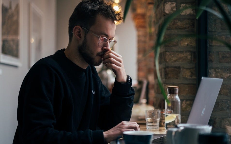 man using a laptop man using a laptop