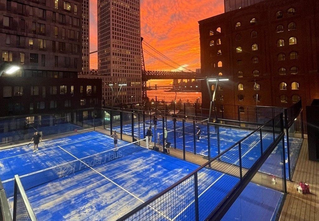 Sunset view of rooptop padel courts at Padel Haus in Brooklyn