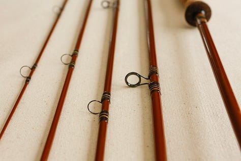 A custom 4wt fiberglass fishing rod with styling inspired by a 1970s Ford Bronco.