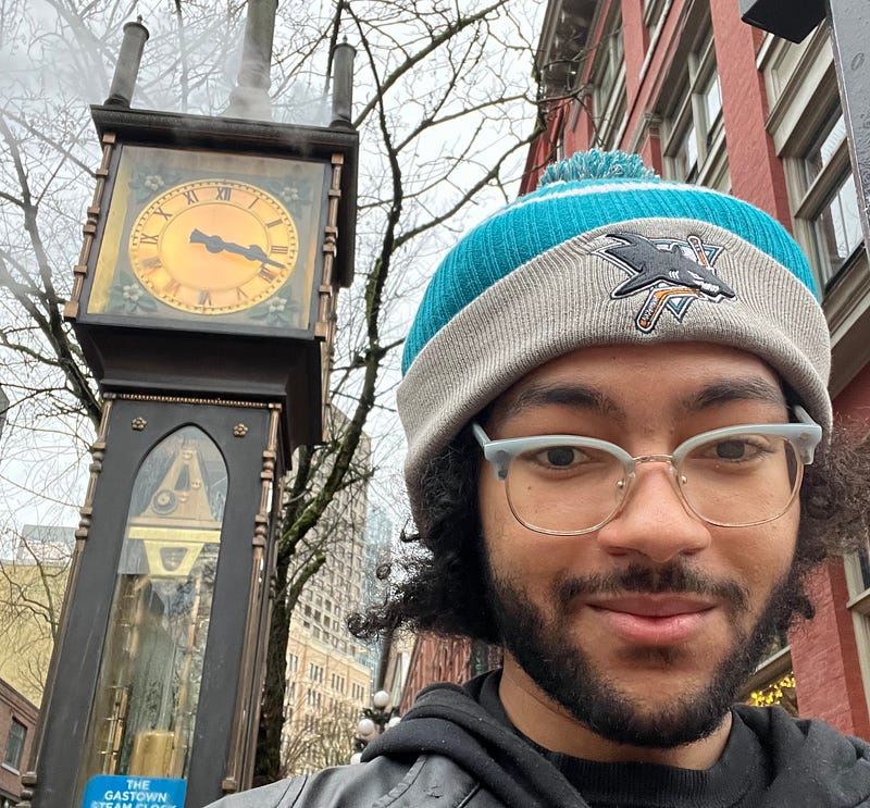 A picture of my next to the Gastown Steam Clock