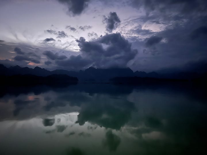 Landscape pics of turquoise water, and a lake reflecting a sunrise.