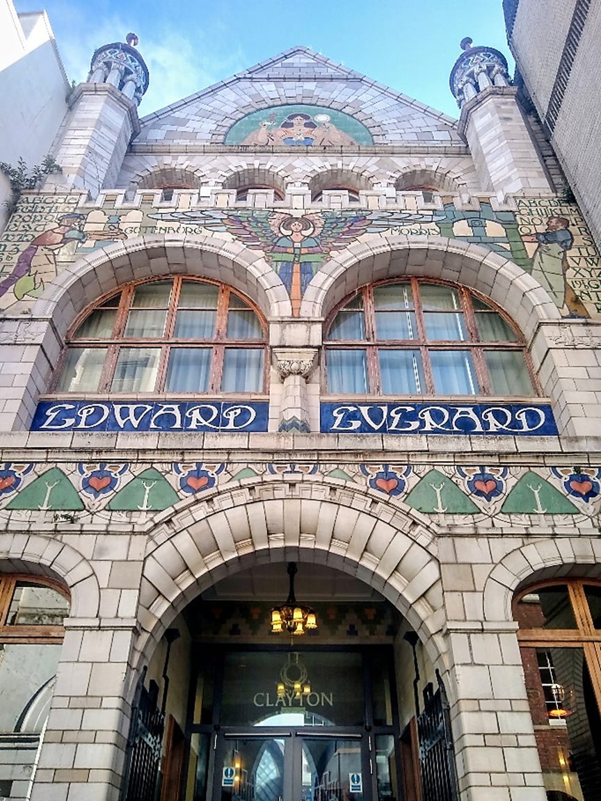 A building with a mosaic on the front
AI-generated content may be incorrect. A building with a mosaic on the front
AI-generated content may be incorrect.