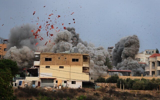 Smoke rises following an Israeli airstrike in the village of Tayr Debba, southern Lebanon, November 6, 2025. (AP Photo/Mohammad Zaatari)