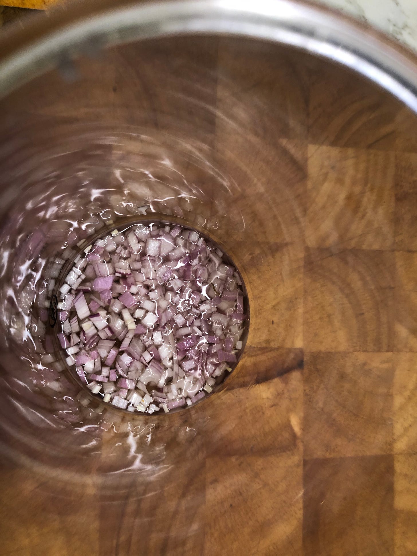 Minced shallots in vinegar