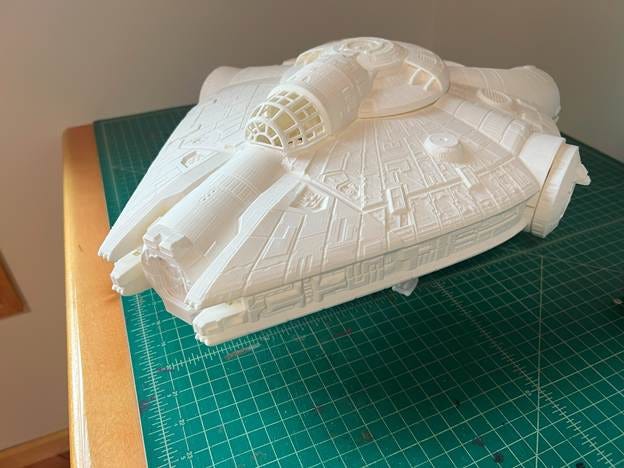 A model of a spaceship on a cutting mat

AI-generated content may be incorrect.