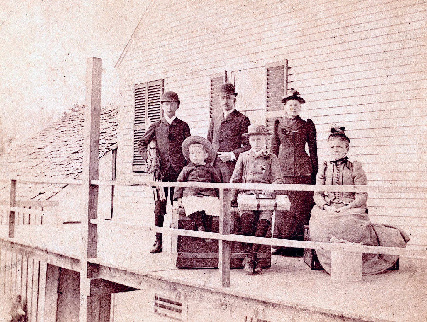 Six people on a porch