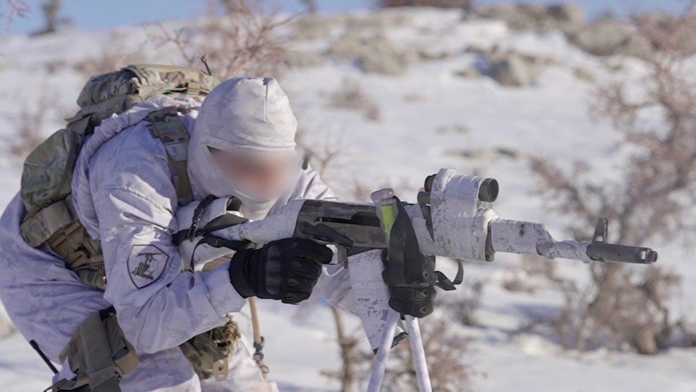 A Hezbollah fighter during military drills in the snow, which was released on February 15, 2022 (Islamic Resistance Military Media) A Hezbollah fighter during military drills in the snow, which was released on February 15, 2022 (Islamic Resistance Military Media)