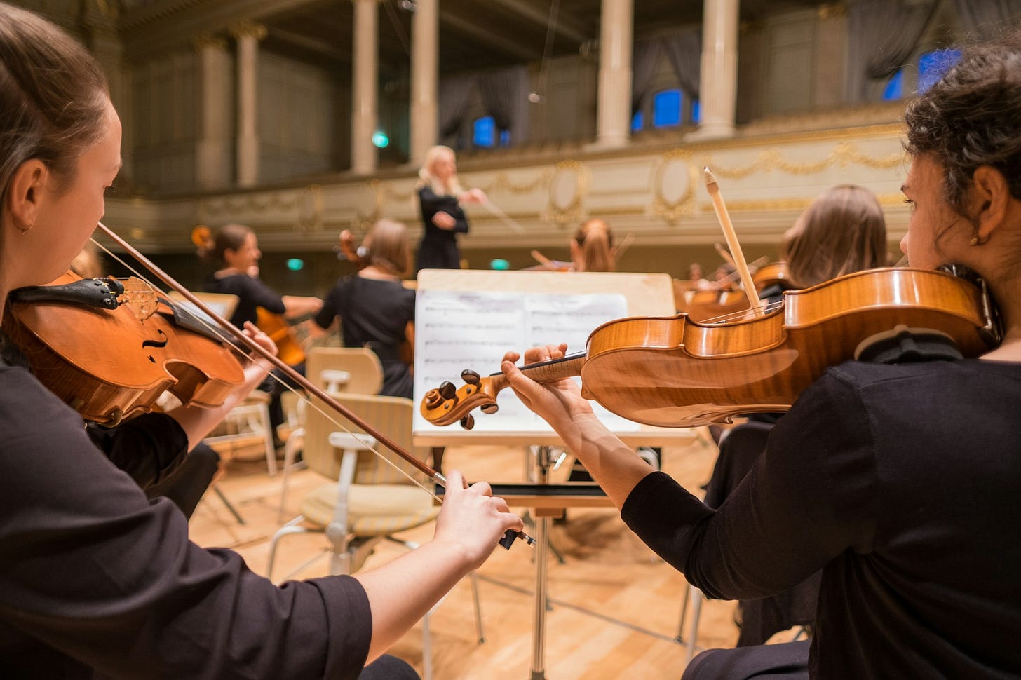 orchestra playing their piece orchestra playing their piece