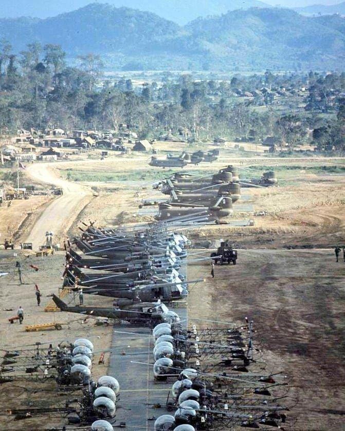 An Khe Army base, famously known as 'the Golf Course,' serving as the helipad for the 1st Cavalry Division in central Vietnam, 1965. Photograph by Larry Burrows.