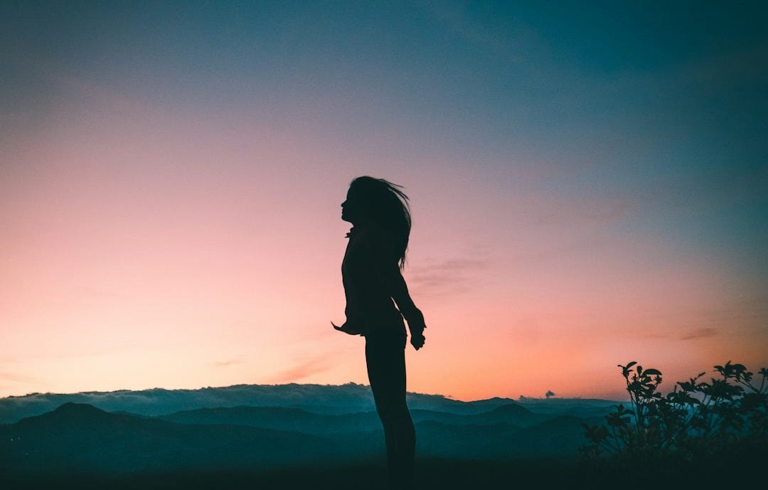 silhouette of woman jumping silhouette of woman jumping