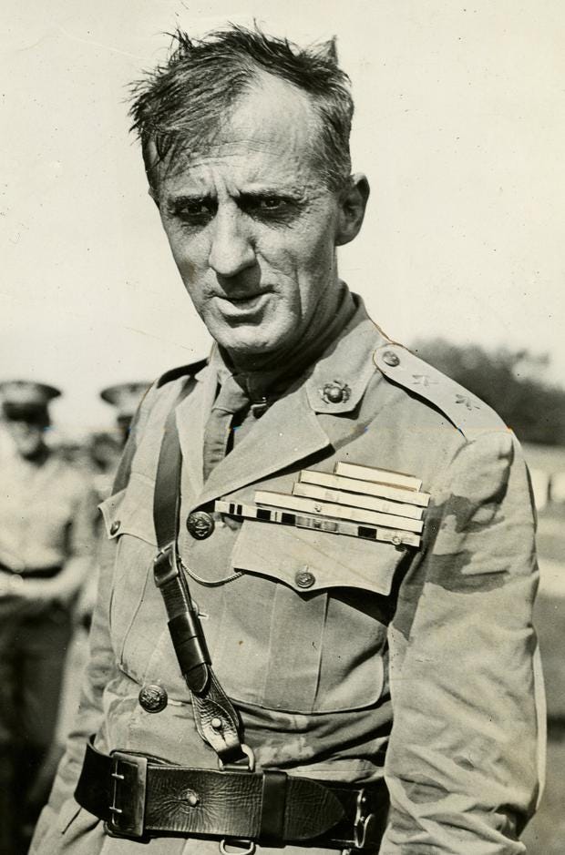 A person in a military uniform
Description automatically generated