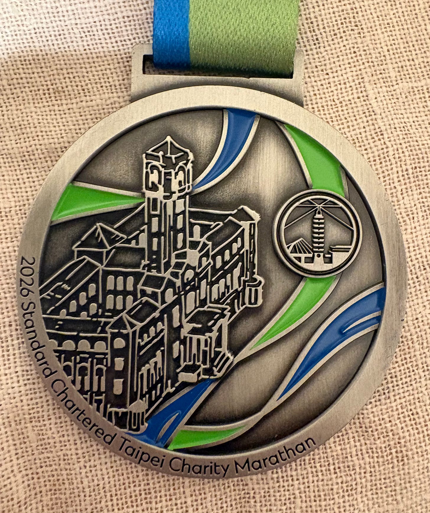 Misprint in 2026 Standard Chartered Marathon finisher medal. Misprint in 2026 Standard Chartered Marathon finisher medal.