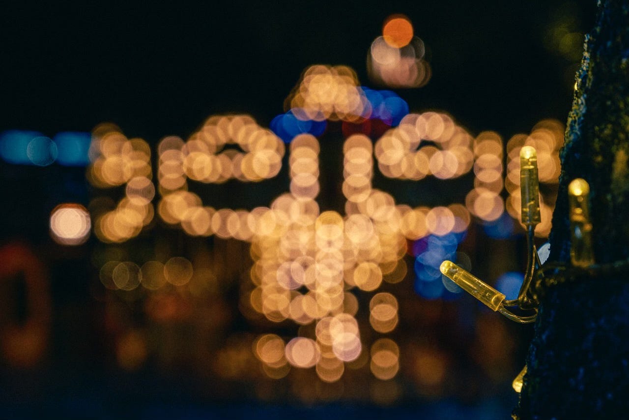Lights of the Wonderland winter fair are seen blurred. Lights of the Wonderland winter fair are seen blurred.