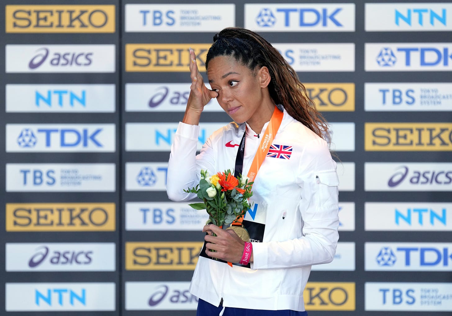 Great Britain's Katarina Johnson-Thompson wipes away a tear on receiving her gold medal for the Women's Heptathlon during day three of the World Athletics Championships in Budapest, Great Britain's Katarina Johnson-Thompson wipes away a tear on receiving her gold medal for the Women's Heptathlon during day three of the World Athletics Championships in Budapest,