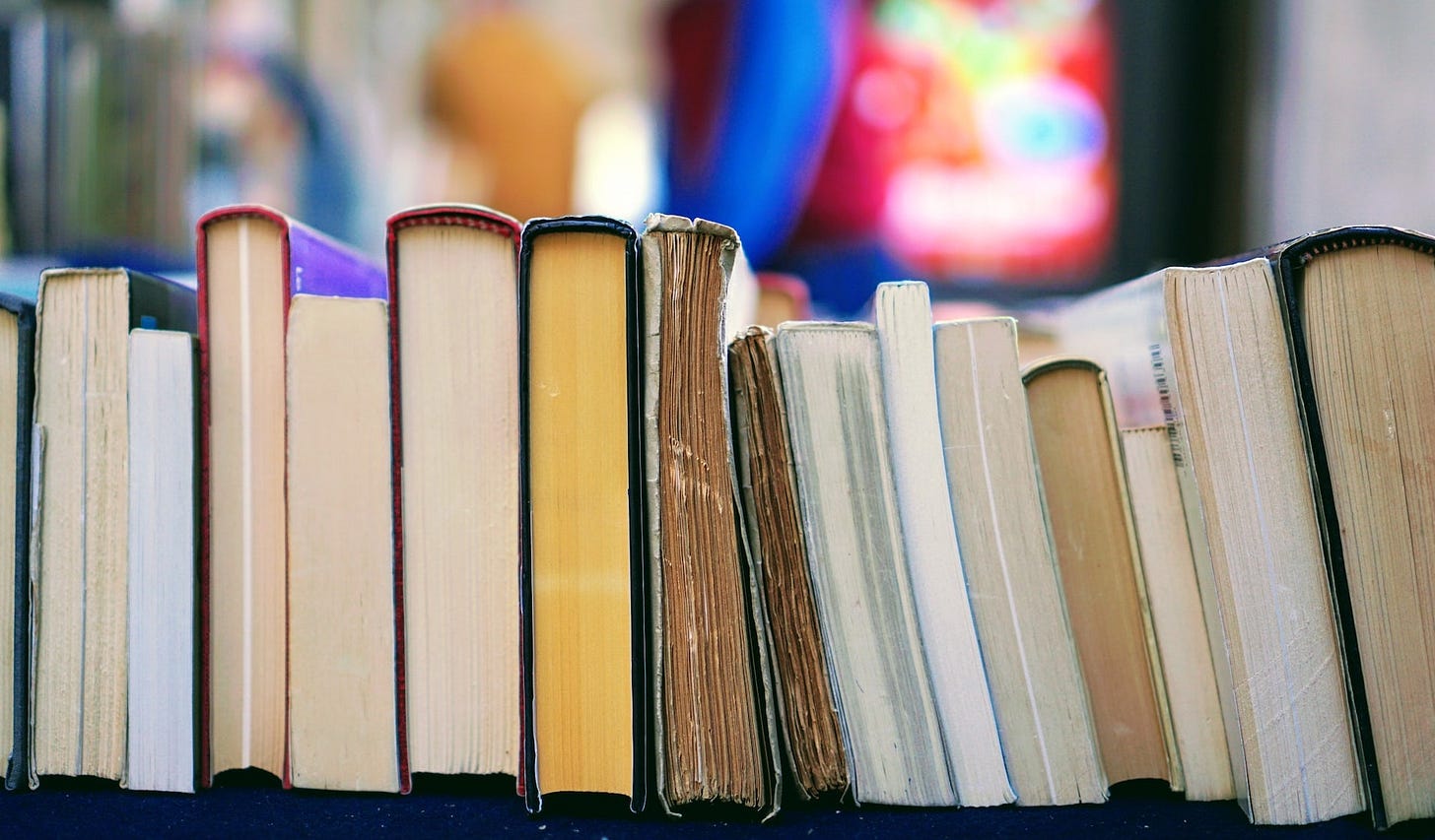 books in row, spine up books in row, spine up