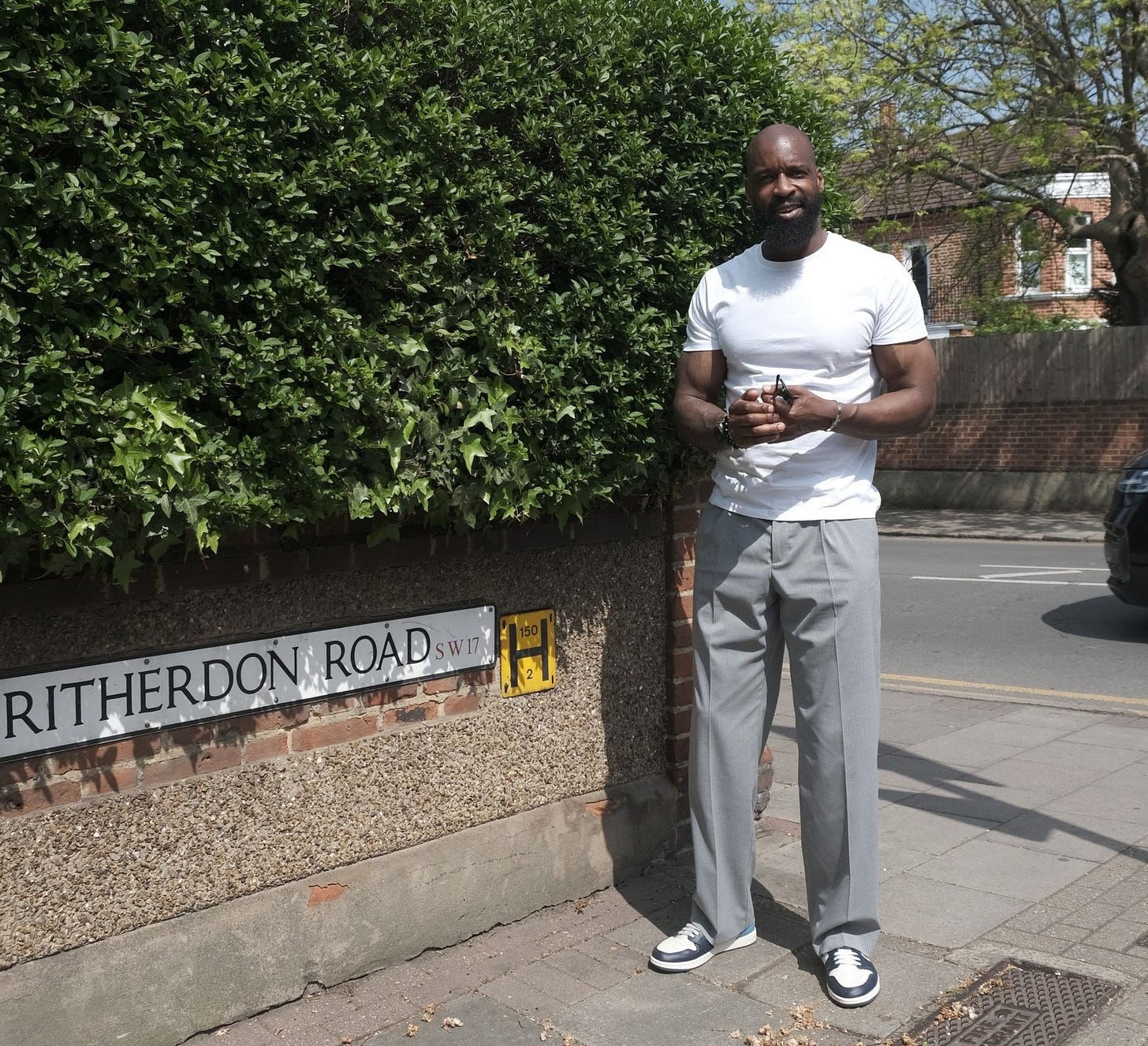 May be an image of 1 person, wingtip shoes and text